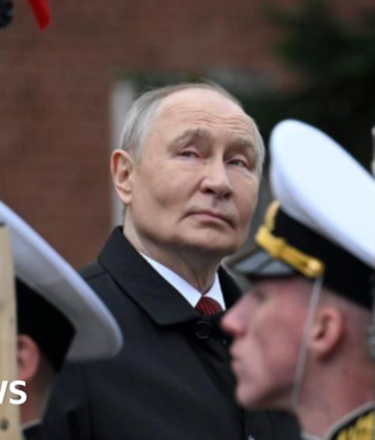 Putin denounces Nato at scaled back Victory Day parade