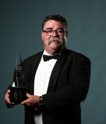 Acknowledging the shared birthday of Travis Boon – a day to celebrate hirsute cult heroes David Boon poses after being inducted into the Australian Cricket Hall of Fame