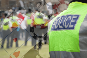 Britain launches coordinated taskforce targeting illegal gambling payments advertising and operators UK taskforce investigate illegal online gambling and betting fraud with casino chips, playing cards and digital payment systems illustration