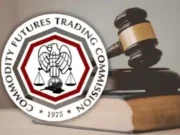 CFTC defends prediction markets authority against mounting state gambling challenges CFTC logo beside judge gavel illustrating federal legal battle over prediction markets and state gambling regulations