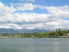 Confederated Salish and Kootenai Tribes open 400 Horses Casino in Montana An image of Polson, Montana with a lake in the foreground and mountains in the background.