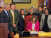 Gov. Reynolds signs Iowa sweepstakes and gambling crackdown expanding enforcement and revising tax withholding Iowa Governor Kim Reynolds signs Senate File 2289 expanding gambling enforcement and updating tax withholding rules in Des Moines.
