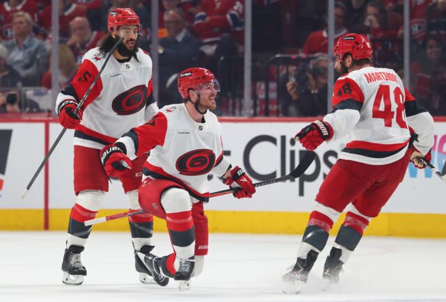NHL Stanley Cup Playoffs: Conference primer as the race for MONTREAL, CANADA - MAY 25: Andrei Svechnikov #37 of the Carolina Hurricanes celebrates with Jordan Martinook #48 and Jalen Chatfield #5 after scoring the game-winning goal against the Montréal Canadiens during overtime in Game Three of the Eastern Conference Final of the 2026 Stanley Cup Playoffs at Bell Centre on May 25, 2026 in Montreal, Quebec, Canada. (Photo by Bruce Bennett/Getty Images)