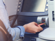 Pennsylvania bank manager imprisoned after stealing funds to support gambling habit Person inserting bank card into ATM during cash withdrawal transaction at Citizens Bank style automated teller machine. Pennsylvania bank manager imprisoned after stealing funds to support gambling habit