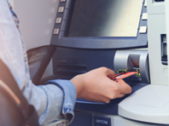 Pennsylvania bank manager imprisoned after stealing funds to support gambling habit Person inserting bank card into ATM during cash withdrawal transaction at Citizens Bank style automated teller machine. Pennsylvania bank manager imprisoned after stealing funds to support gambling habit