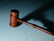 US soldier pleads not guilty in first prediction market insider trading case tied to Polymarket bets A coutroom gavel sitting on a desk.