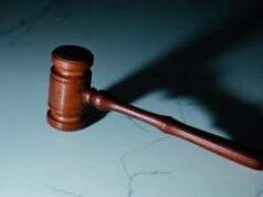 US soldier pleads not guilty in first prediction market insider trading case tied to Polymarket bets A coutroom gavel sitting on a desk.