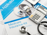 Burbank laboratory owner jailed after Medicare fraud funded gambling habit Medicare insurance enrollment documents with stethoscope and calculator, illustrating healthcare fraud investigations, Medicare reimbursement claims, medical billing and tax evasion cases. Burbank laboratory owner jailed after Medicare fraud funded gambling habit